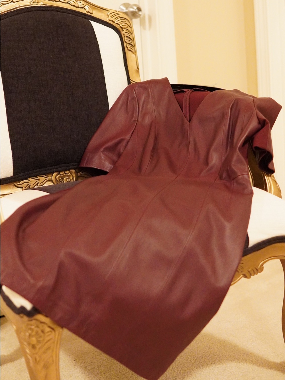 Women’s faux leather burgundy dress size 10.